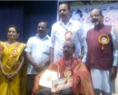 Akashvani asst director Dr Perla conferred title, Karavaliya Kalpatharu